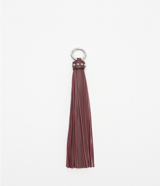 TASSEL CHARM WITH STUDS