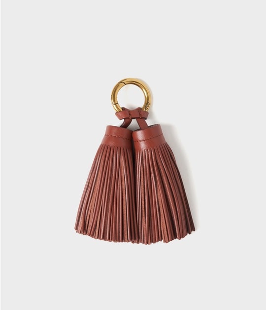 DOUBLE TASSEL CHARM